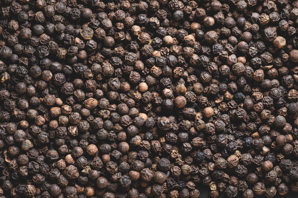 full frame view of dried aromatic peppercorns background - Photo, Image