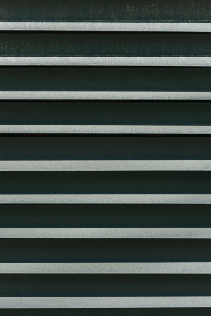 γκρο πλαν θέα λεπτομέρεια υφή φόντου μεταλλικό φράχτη - Φωτογραφία, εικόνα
