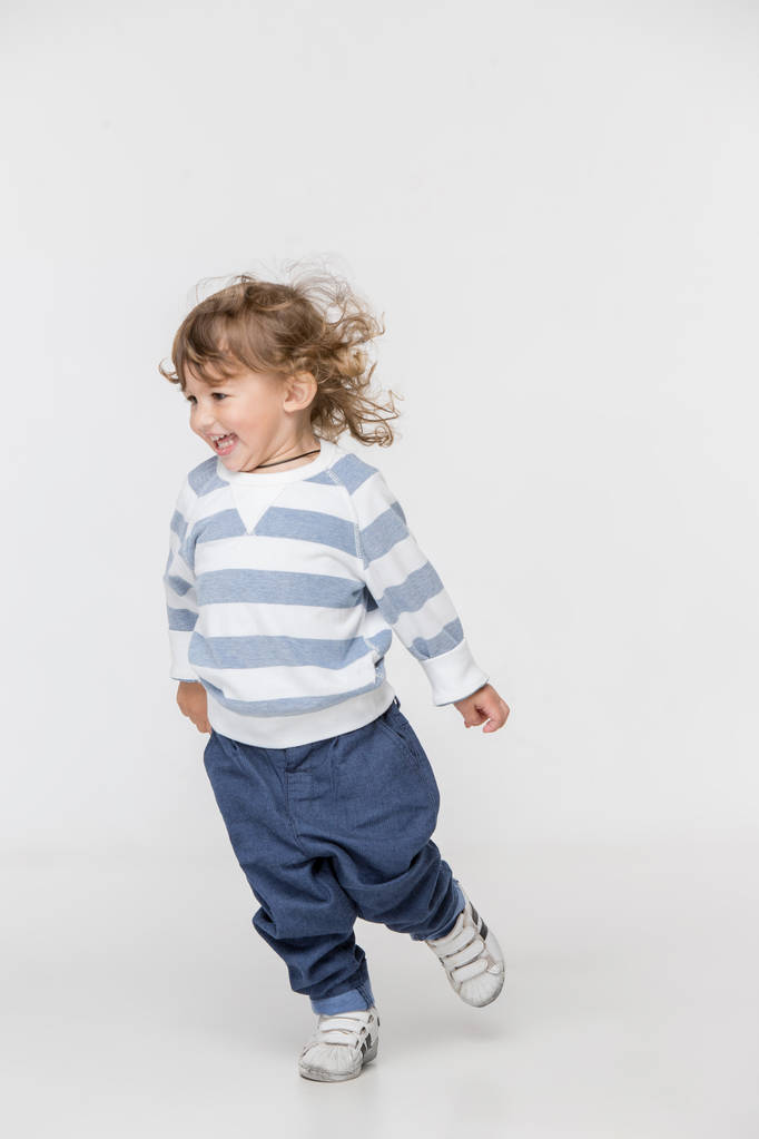 Portrait of happy joyful beautiful little boy, studio shot - Photo, Image