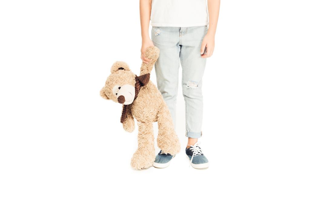 cropped image of child holding teddy bear isolated on white - Photo, Image