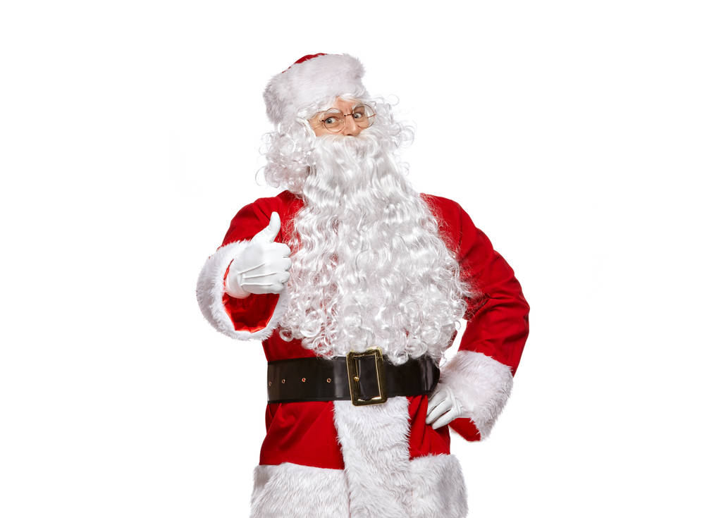 Santa Claus elszigetelt fehér background. Santa Claus mutatja thumbs up. - Fotó, kép
