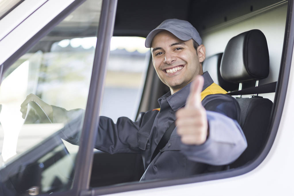 Smiling van driver showing thumb up  - Photo, Image