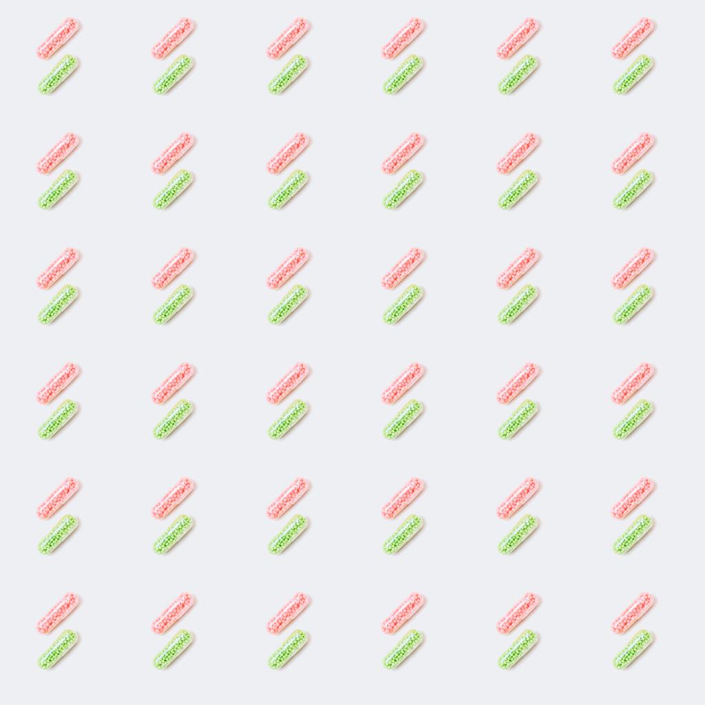 patrón sin costuras de cápsulas médicas de color rosa y verde en blanco
 - Foto, Imagen