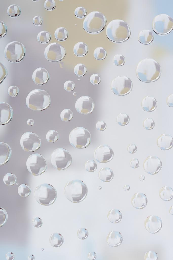 vue rapprochée de belles gouttes de pluie transparentes sur fond abstrait flou
   - Photo, image