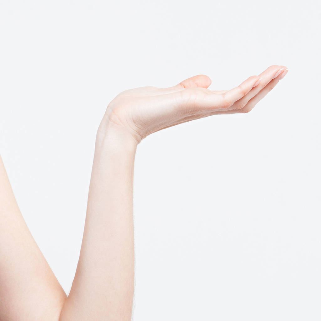 Mão de mulher jovem com palma para cima close-up. Modelo para a demonstração de mercadorias
 - Foto, Imagem