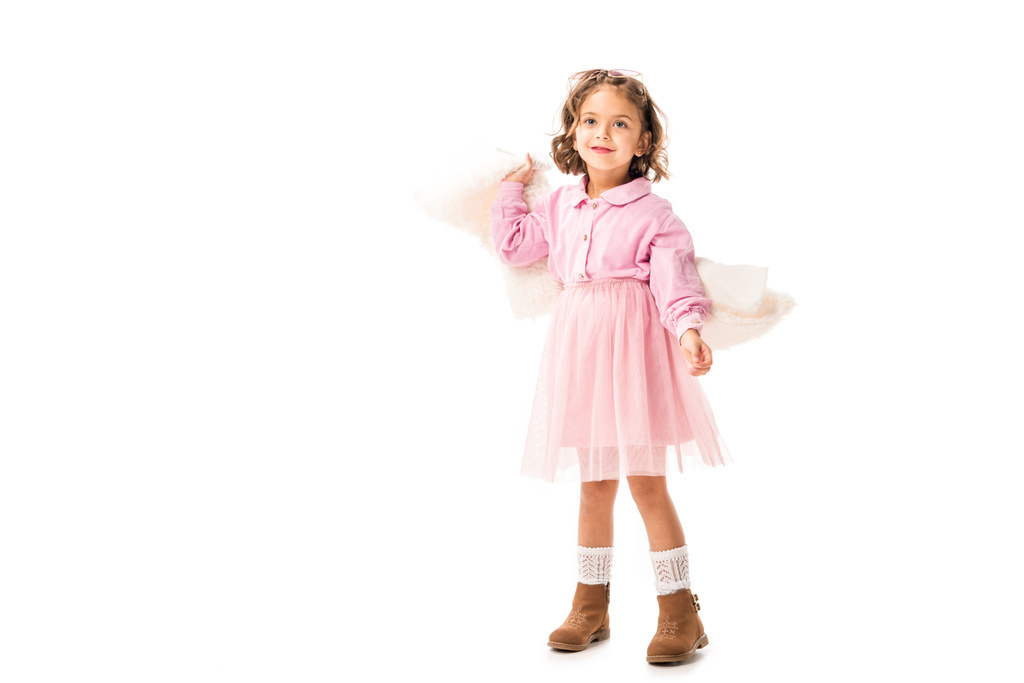 hermoso niño pequeño en ropa rosa divertirse aislado en blanco
 - Foto, Imagen