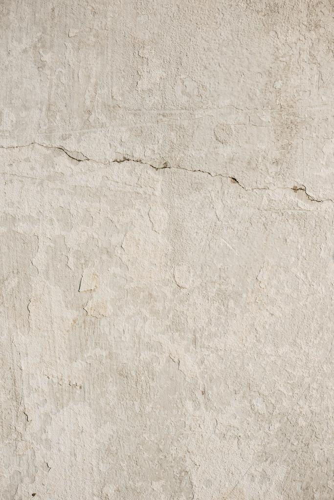 Close up van oude licht beige betonnen wand - Foto, afbeelding