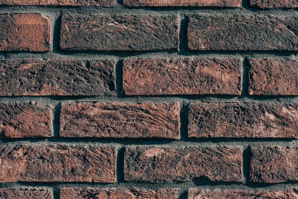 close up de parede de tijolo marrom escuro
 - Foto, Imagem