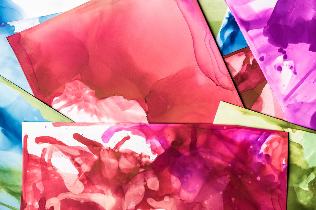 spruzzi rossi, viola e verdi di inchiostri alcolici come sfondo astratto
 - Foto, immagini