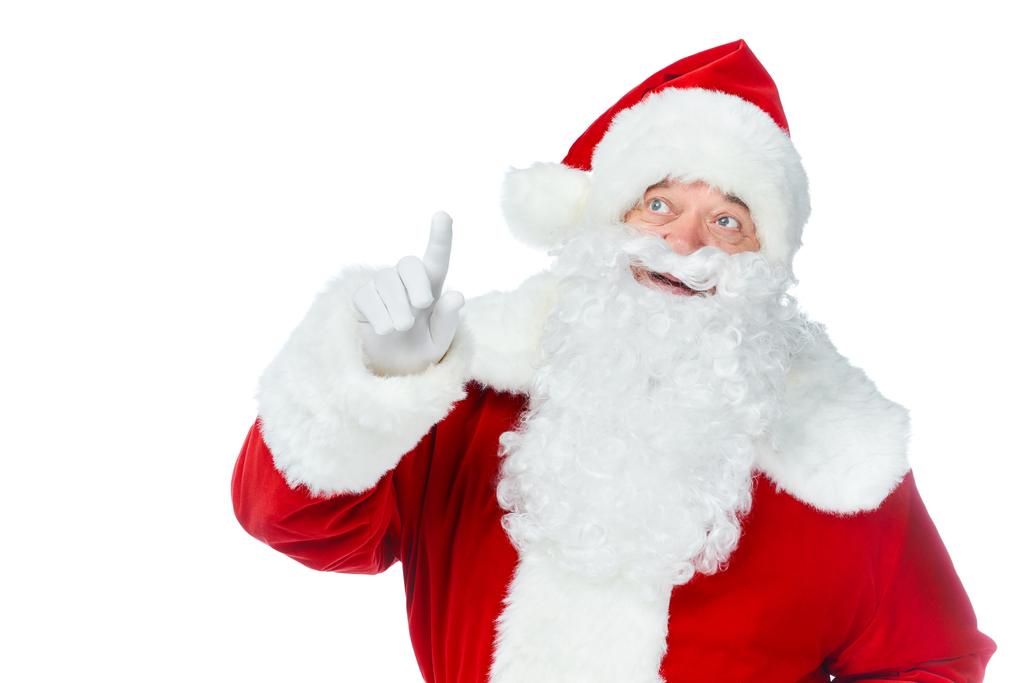Weihnachtsmann zeigt nach oben und hat Idee isoliert auf weiß - Foto, Bild