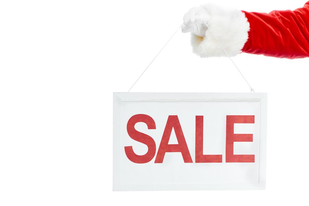vista ritagliata di Babbo Natale azienda bordo vendita isolato su bianco
 - Foto, immagini
