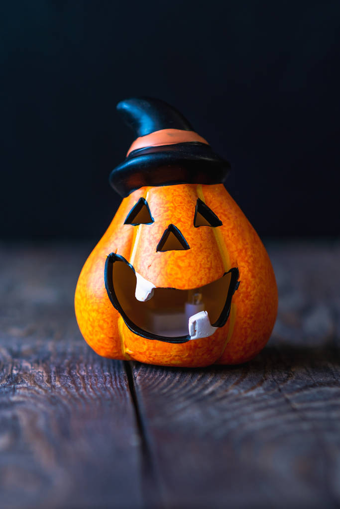 pumpkin in a hat with a cheerful face - Photo, Image