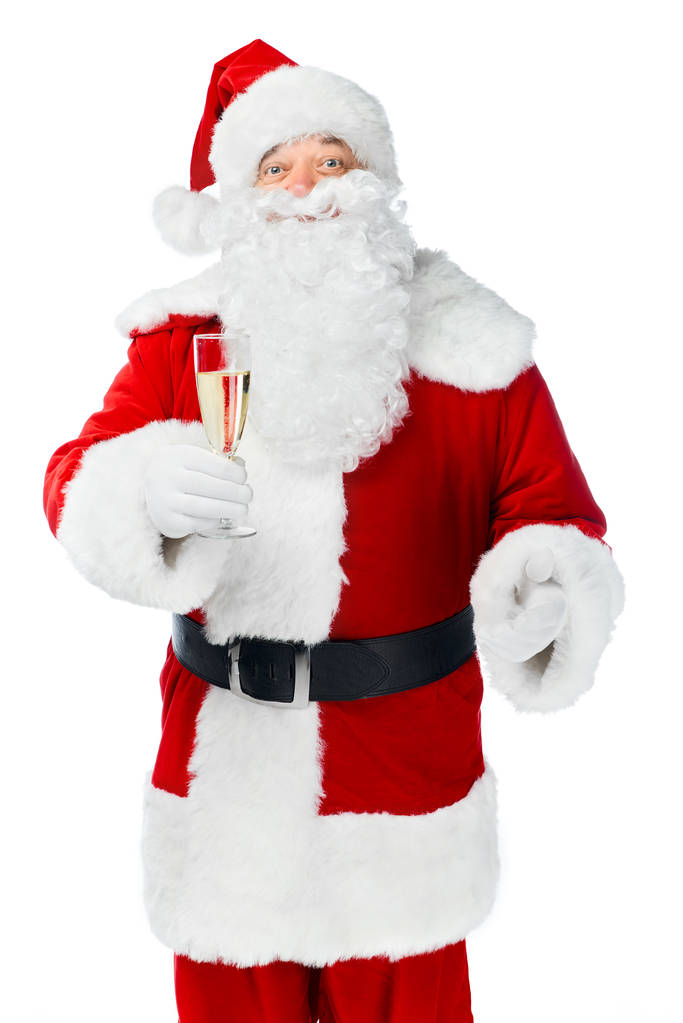 Santa claus γιορτάζει τα Χριστούγεννα με ποτήρι σαμπάνιας που απομονώνονται σε λευκό - Φωτογραφία, εικόνα
