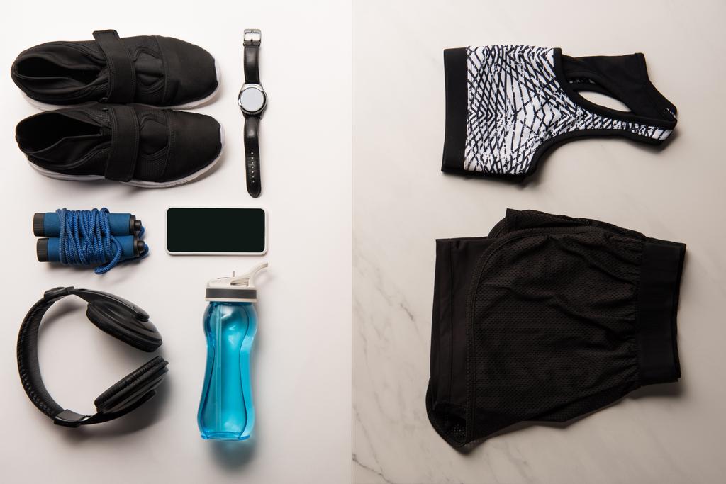 flat lay with arranged set of gym equipment on marble and white - Photo, Image