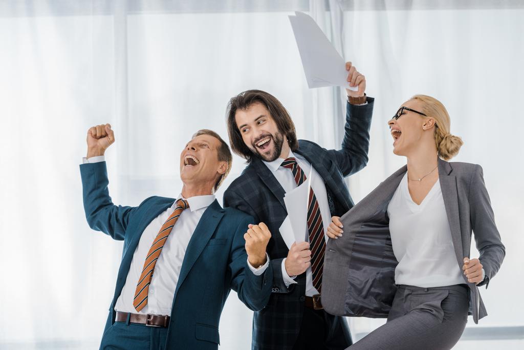 Happy Office Workers Rejoicing Great Deal In Free Stock Photo and Image