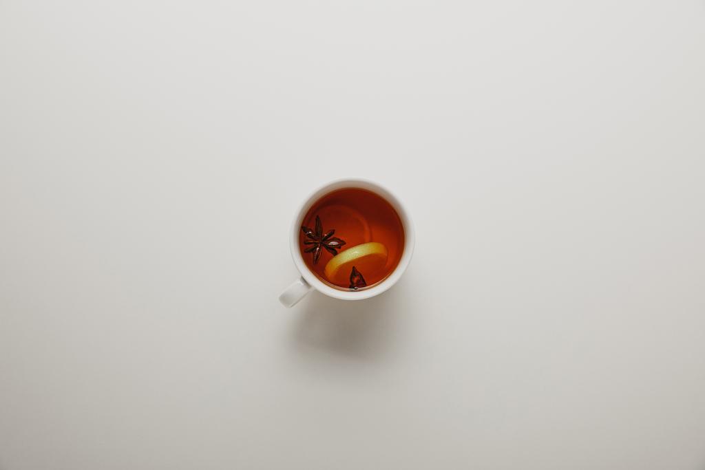 top view of cup of hot tea on white background - Photo, Image