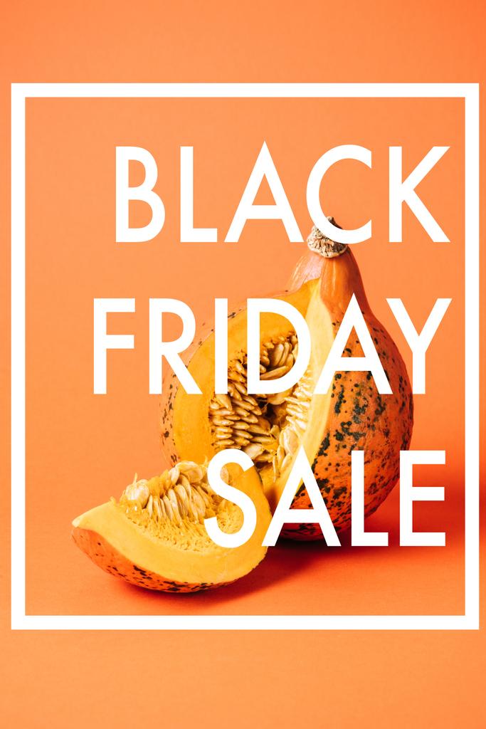 крупним планом розрізаний сирий гарбуз з чорною п'ятницею продаж напис на помаранчевому фоні
 - Фото, зображення