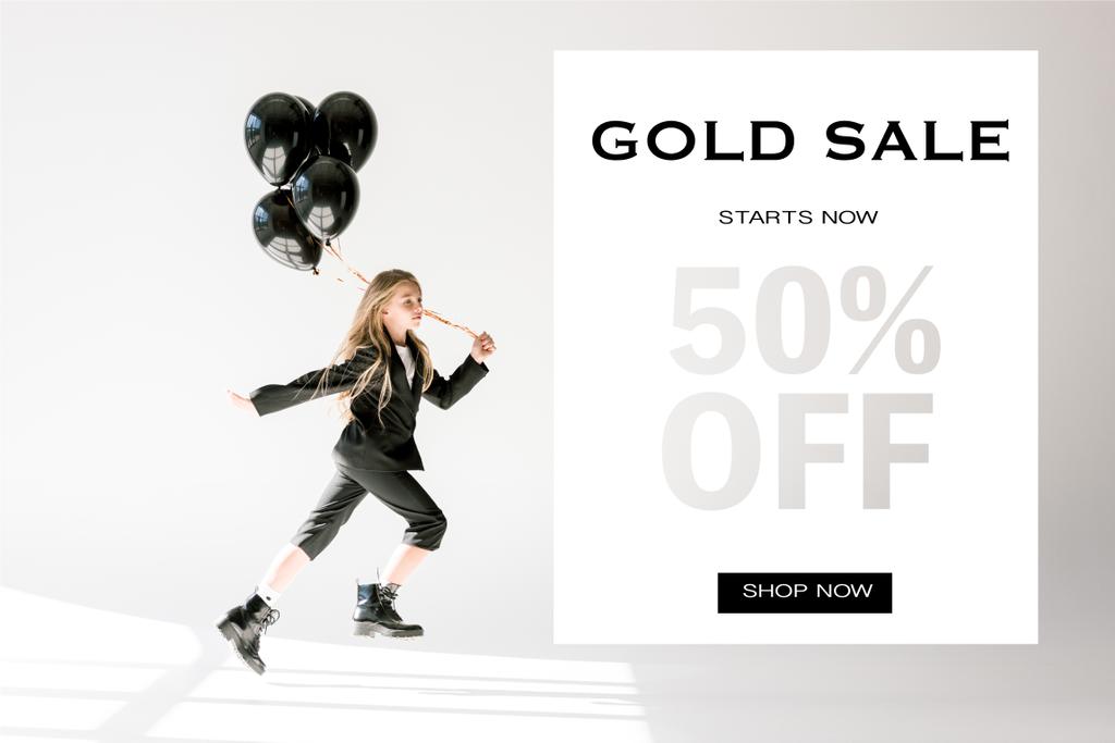 fashionable child in trendy suit jumping with black balloons on grey, gold sale banner concept - Photo, Image