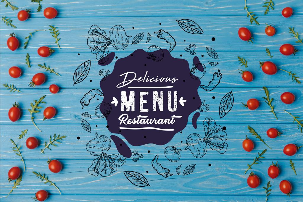 вид зверху на вишневі помідори з руколою на блакитному столі, смачне меню ресторанного написання
 - Фото, зображення