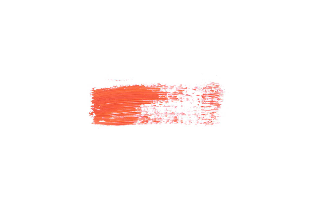 明るいオレンジ色の口紅のストロークが白で隔離の平面図  - 写真・画像
