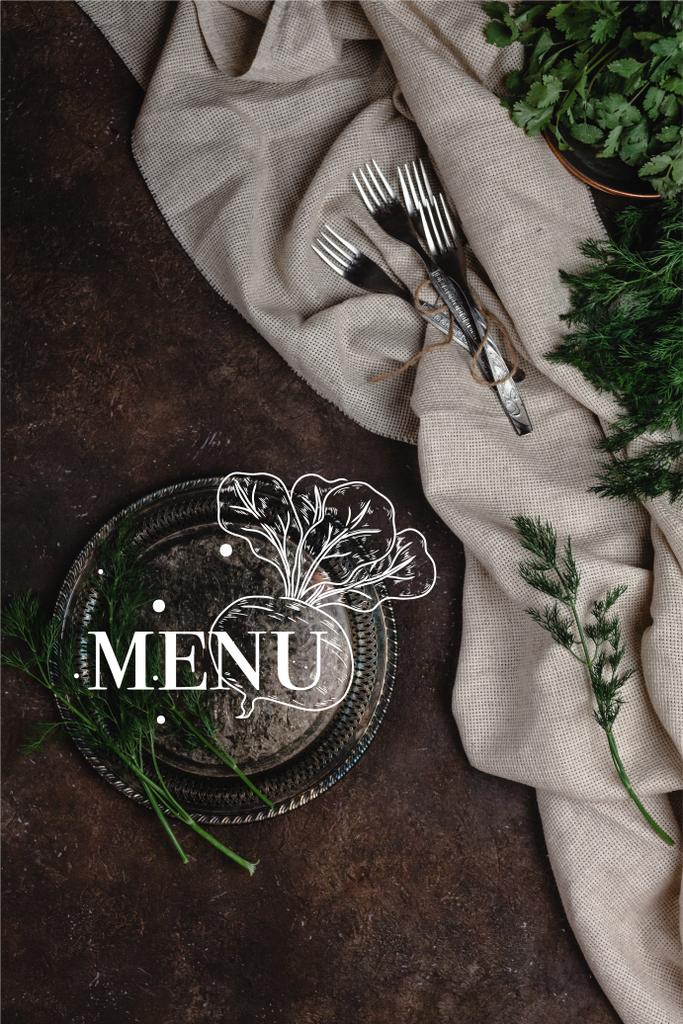 top view of vintage plate with fennel and forks with tablecloth on dark surface, menu lettering - Photo, Image