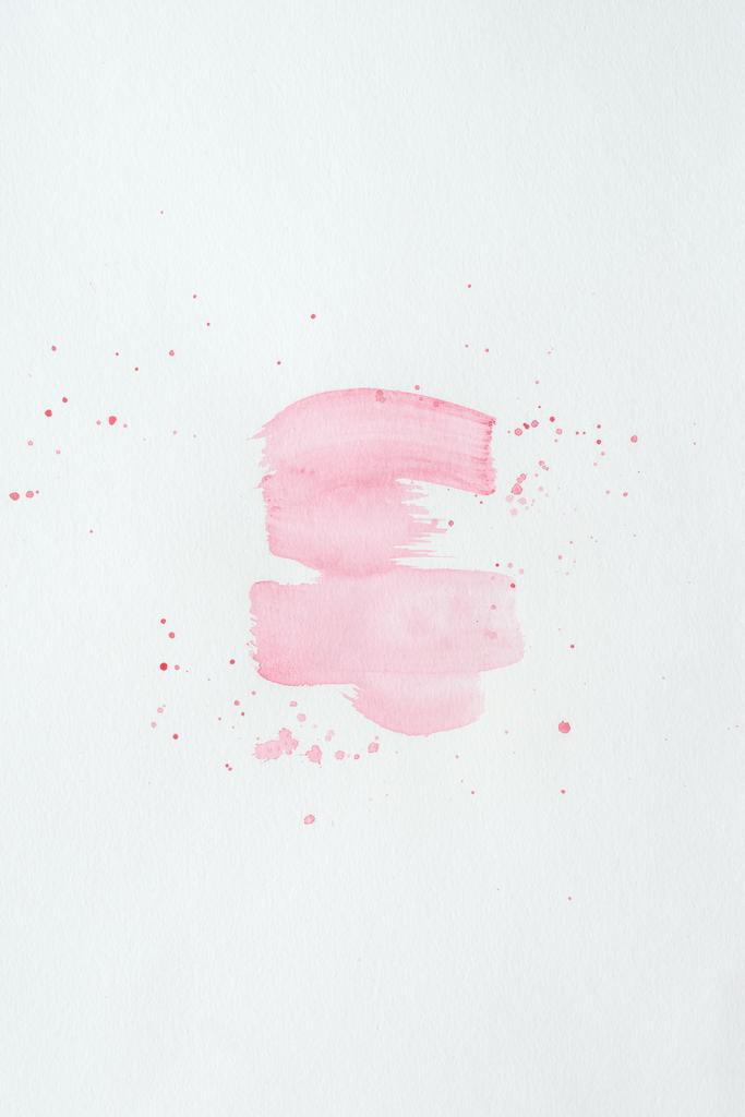 абстрактні світло-рожеві акварельні штрихи з застібками на білому папері
 - Фото, зображення