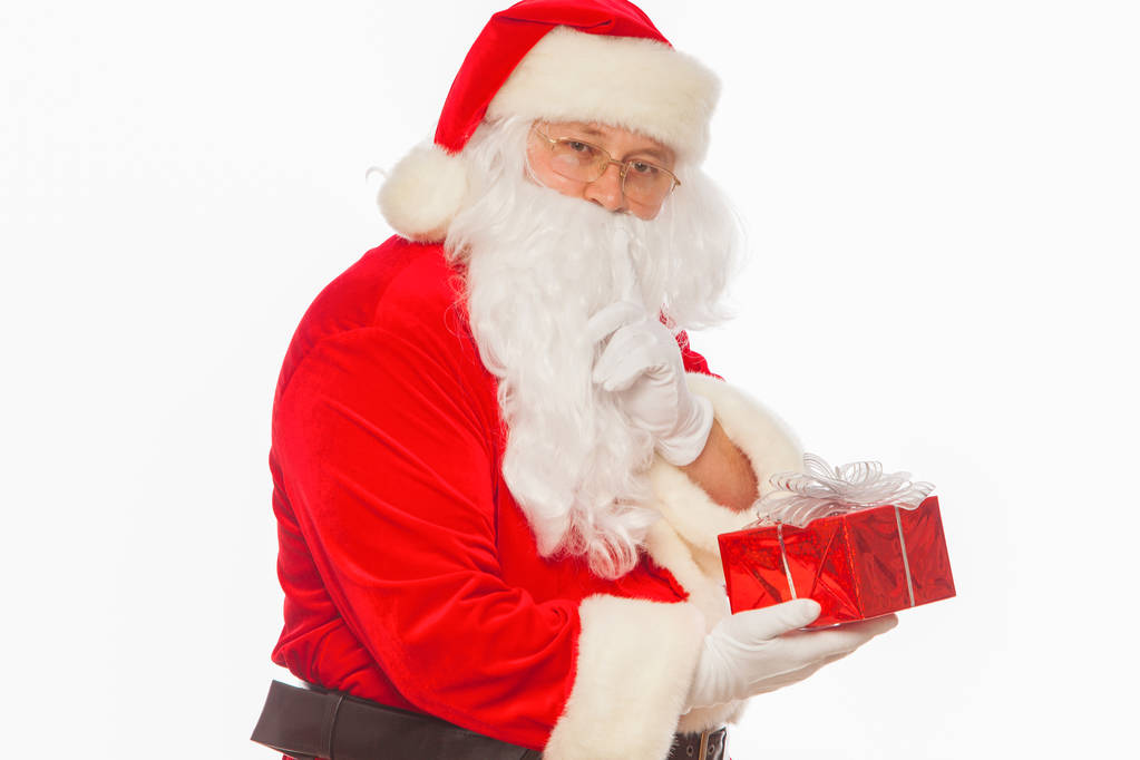 Weihnachtsmann: fröhlich mit kleinem Stapel Geschenke Big Bag, isoliert - Foto, Bild