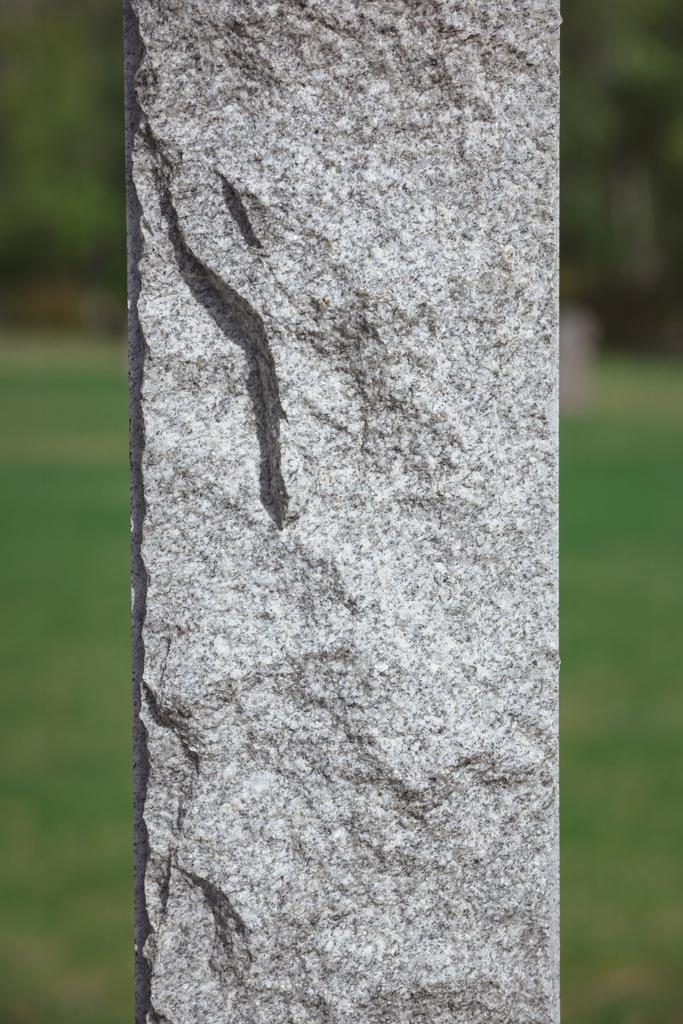 close up shot of stone memorial monument at cemetery  - Photo, Image