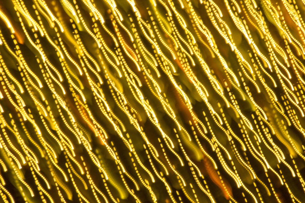 Xmas abstractas Brillos de oro o luces de brillo. Fondo de oro navideño festivo. Partículas bokeh desenfocadas. Plantilla para diseño
 - Foto, Imagen
