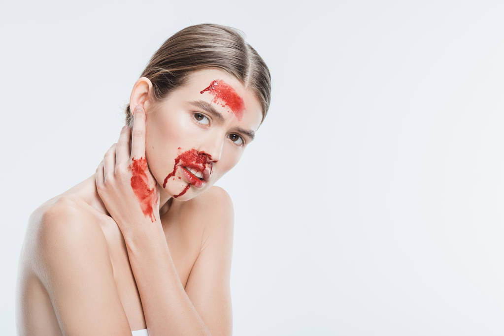 nude female domestic violence victim with red blood isolated on white - Photo, Image