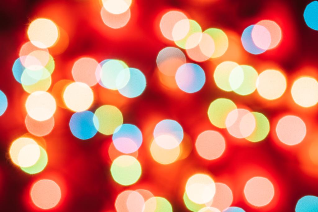 Sfondo natalizio con colorati Bokeh e luci luminose  - Foto, immagini