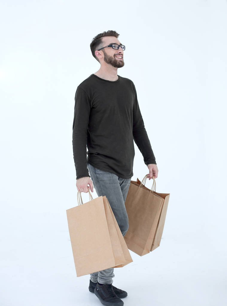 Portret mężczyzny z torbą pełną papieru na szarym - Zdjęcie, obraz