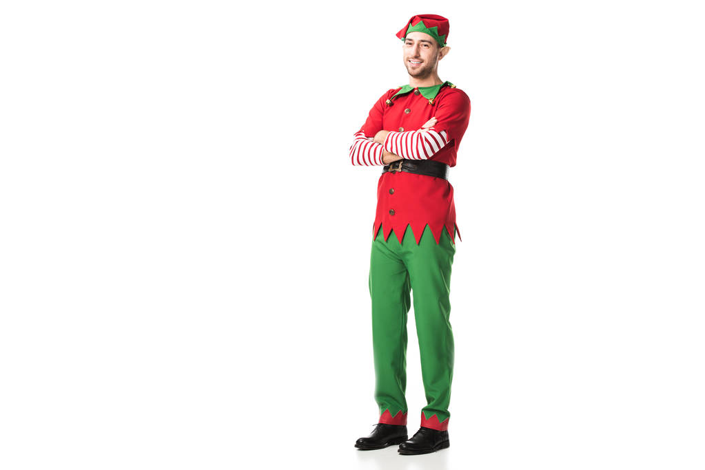 adam Noel elf kostümü çapraz kollu beyaz arka plan üzerinde izole kamera bakıyor - Fotoğraf, Görsel