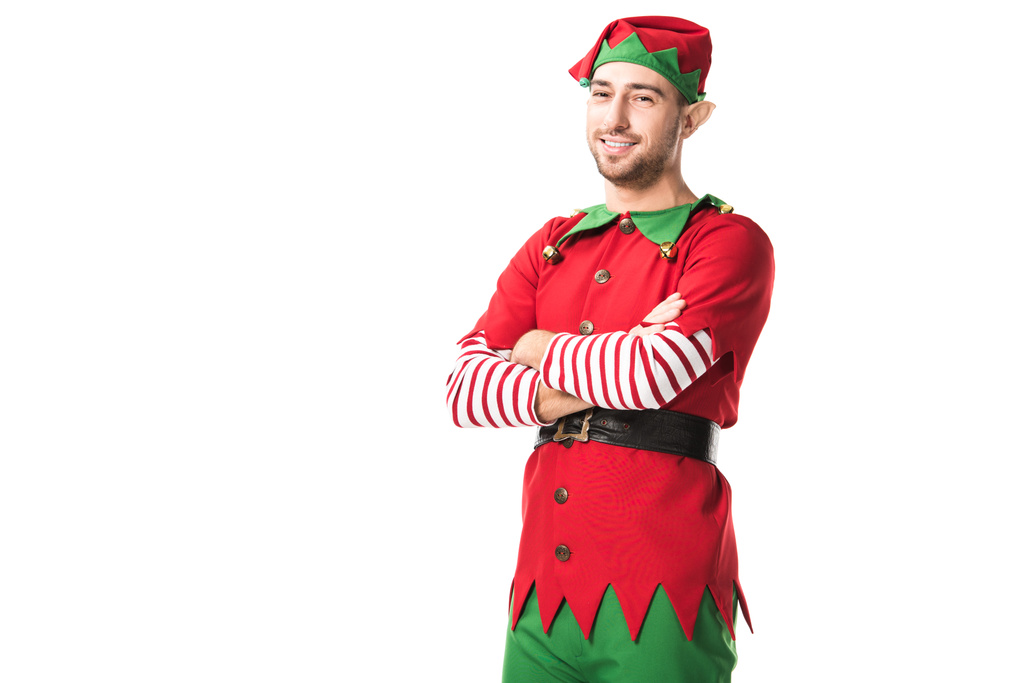 homem em traje de elfo de natal com braços cruzados olhando para a câmera isolada no branco
 - Foto, Imagem