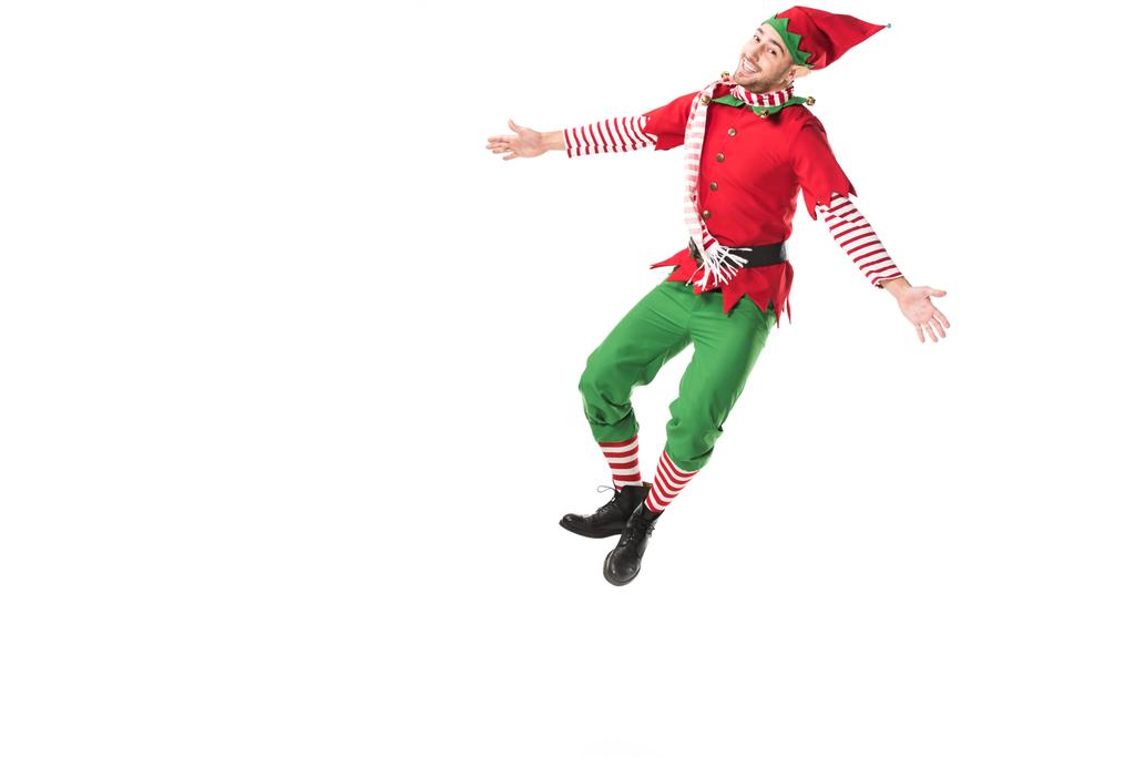 счастливый человек в рождественском костюме эльфа прыжки изолированы на белом фоне
 - Фото, изображение