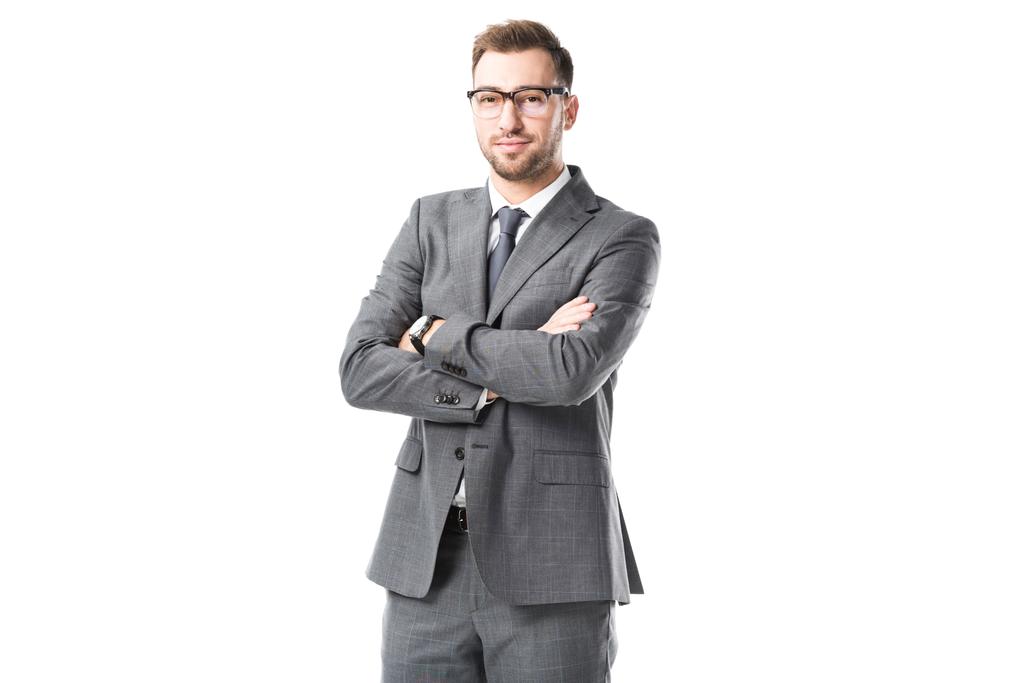 adulto hombre de negocios en traje con los brazos cruzados aislado en blanco
 - Foto, Imagen