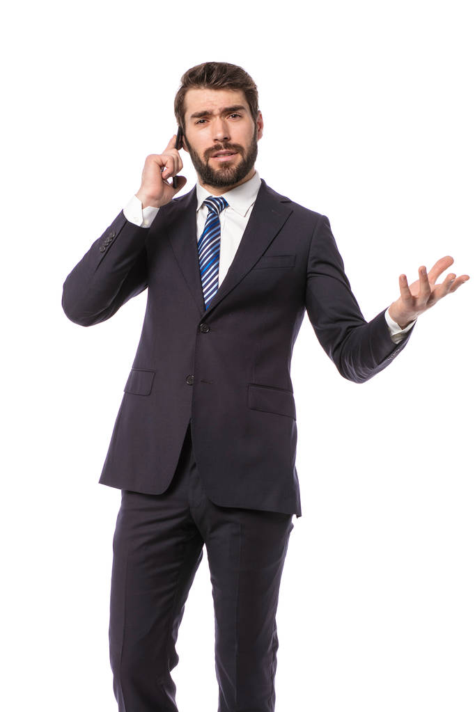uomo d'affari aziendale, elegante uomo d'affari in piedi su sfondo bianco avendo una conversazione sul cellulare
 - Foto, immagini