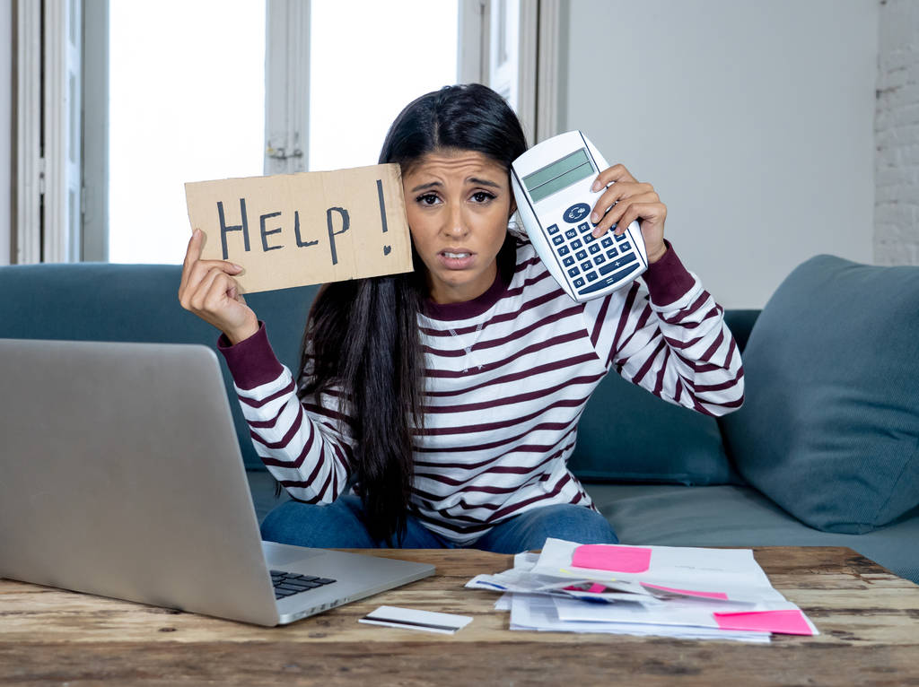 Attractive latin female single mother overwhelmed with home finances needing help paying expenses in living cots stress paying bills problem credit card debts mortgage and bad financial situation. - Photo, Image