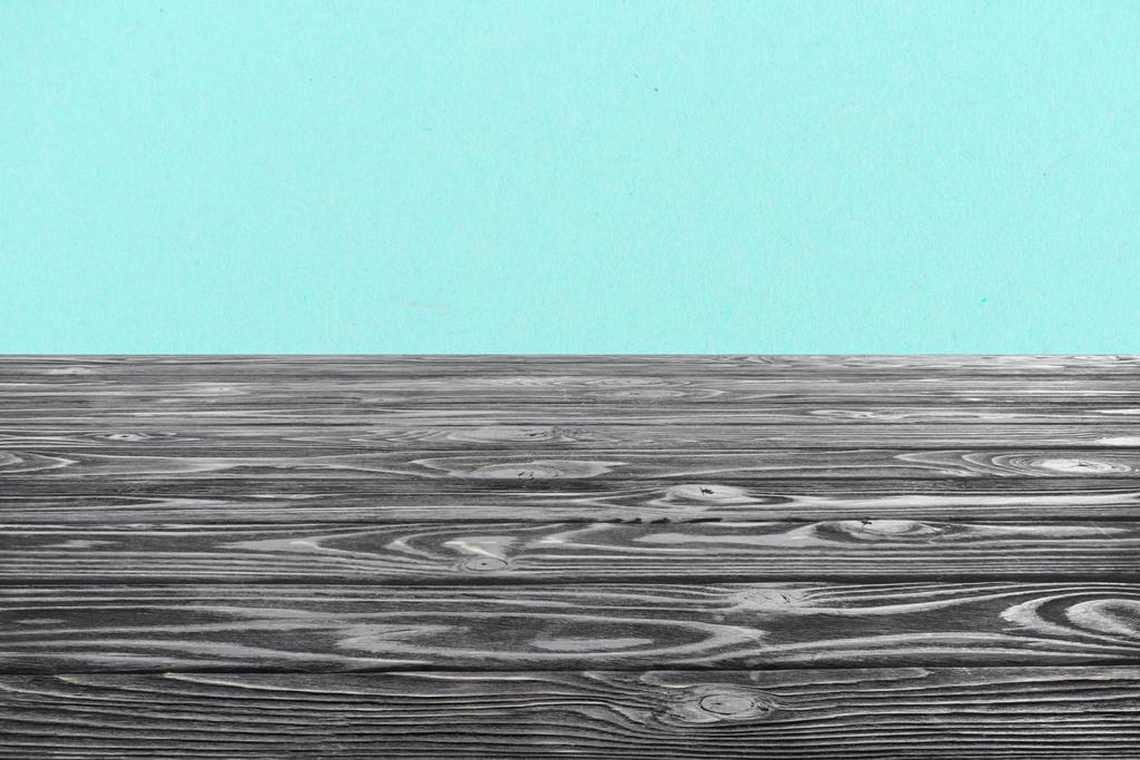 template of grey wooden floor on turquoise background - Photo, Image