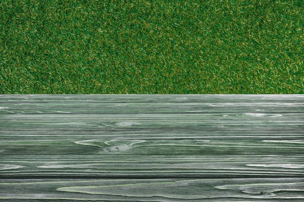 template of dark green wooden floor with green grass on background - Photo, Image