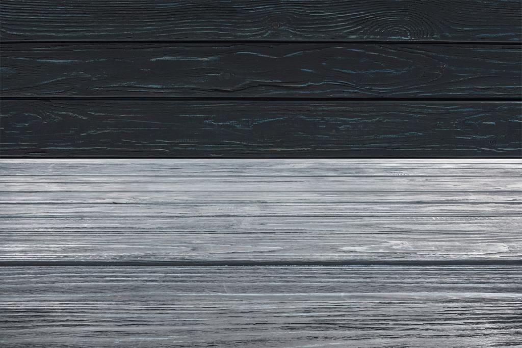 gabarit de plancher en bois gris sur fond de planches noires
  - Photo, image