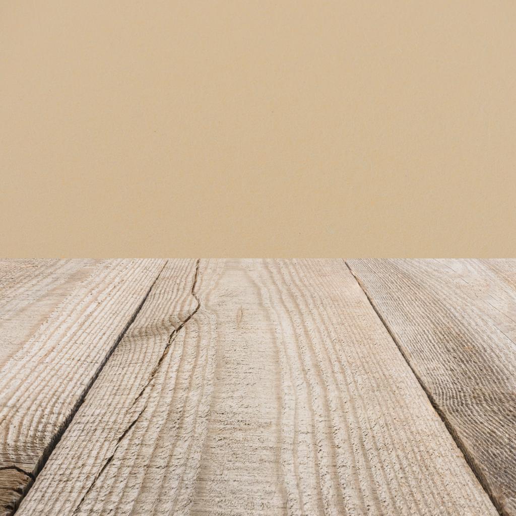 surface of beige wooden planks with dark beige on background - Photo, Image