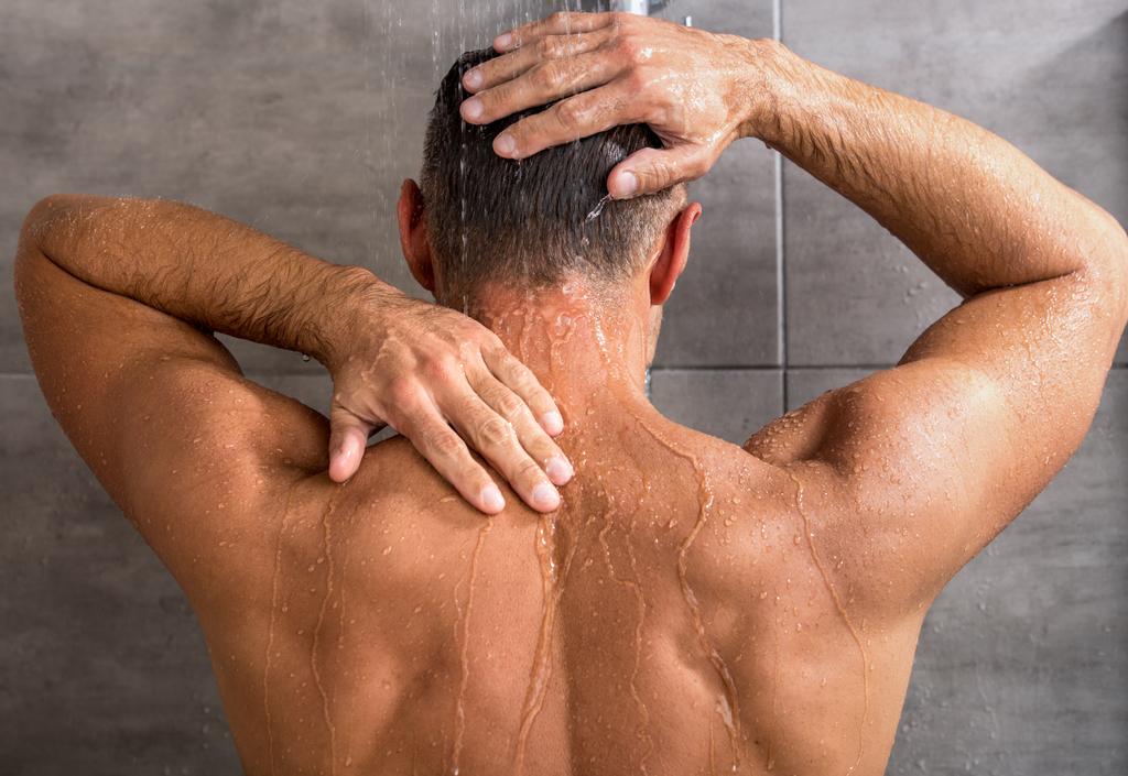 back view of man taking shower in morning at home - Photo, Image
