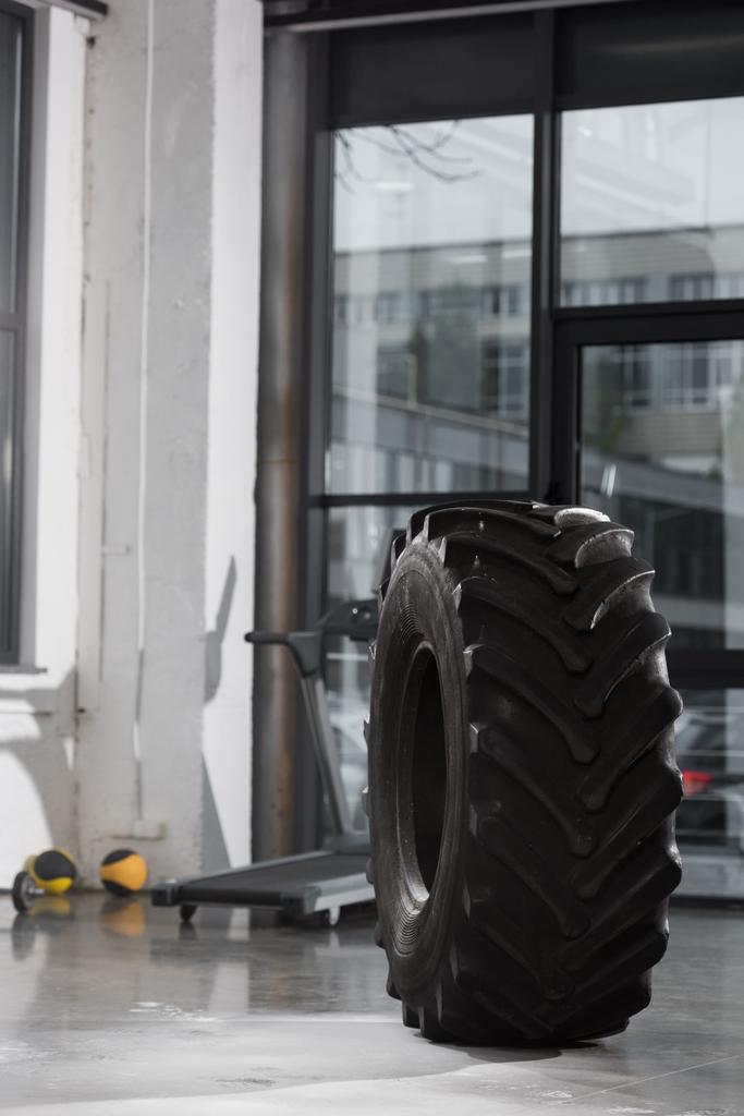 one black tire for workout in gym - Photo, Image