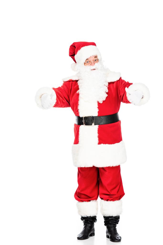 Санта Клаус смотрит в камеру и показывает большие пальцы, изолированные на белом
 - Фото, изображение