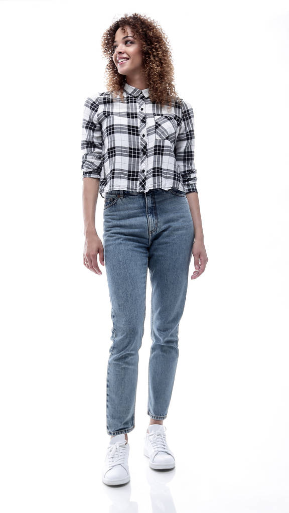 elegantní mladá žena v kostkované košili a džínách. - Fotografie, Obrázek