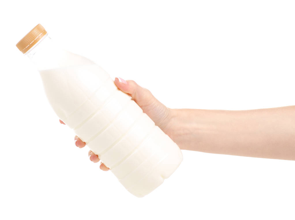 Butelka mleka w rękach - Zdjęcie, obraz