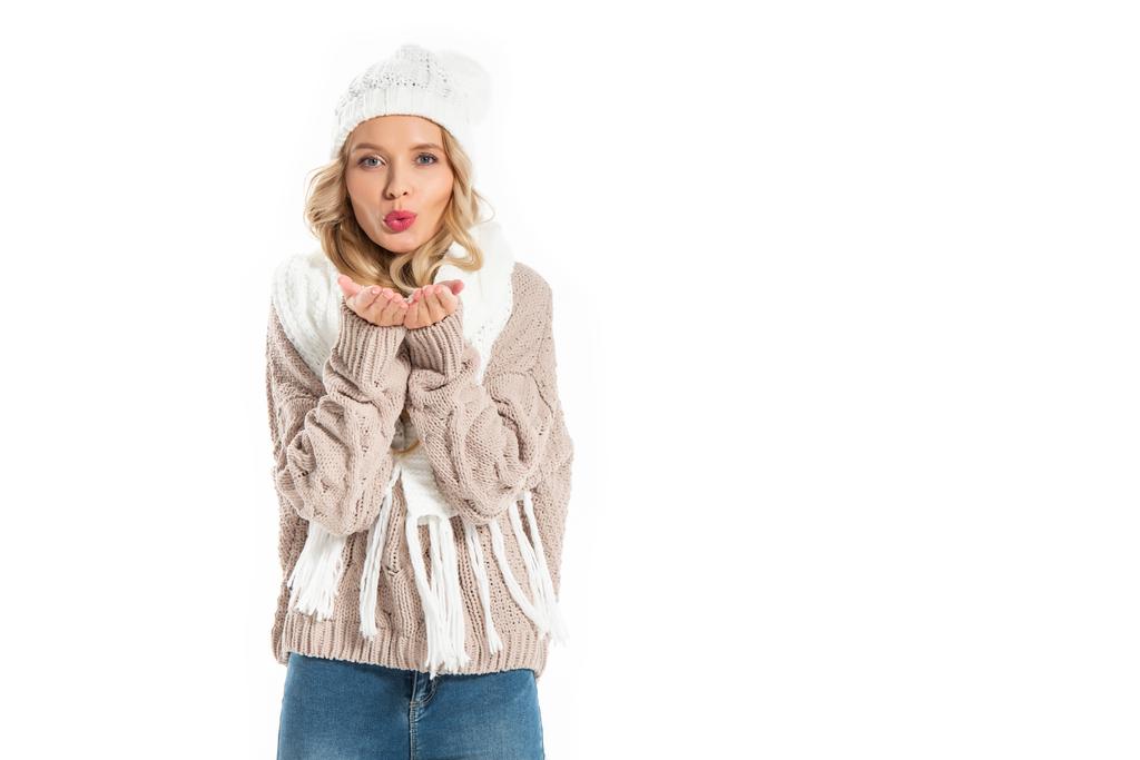 beautiful woman in winter outfit blowing kiss isolated on white - Photo, Image