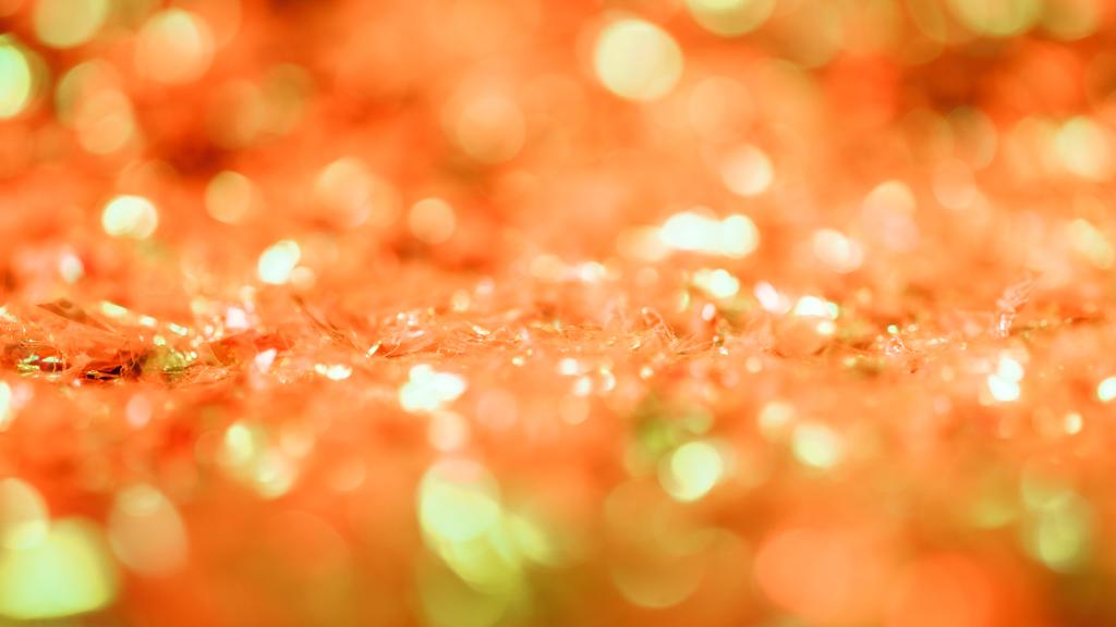 abstract glowing background with orange glitter and bokeh - Photo, Image