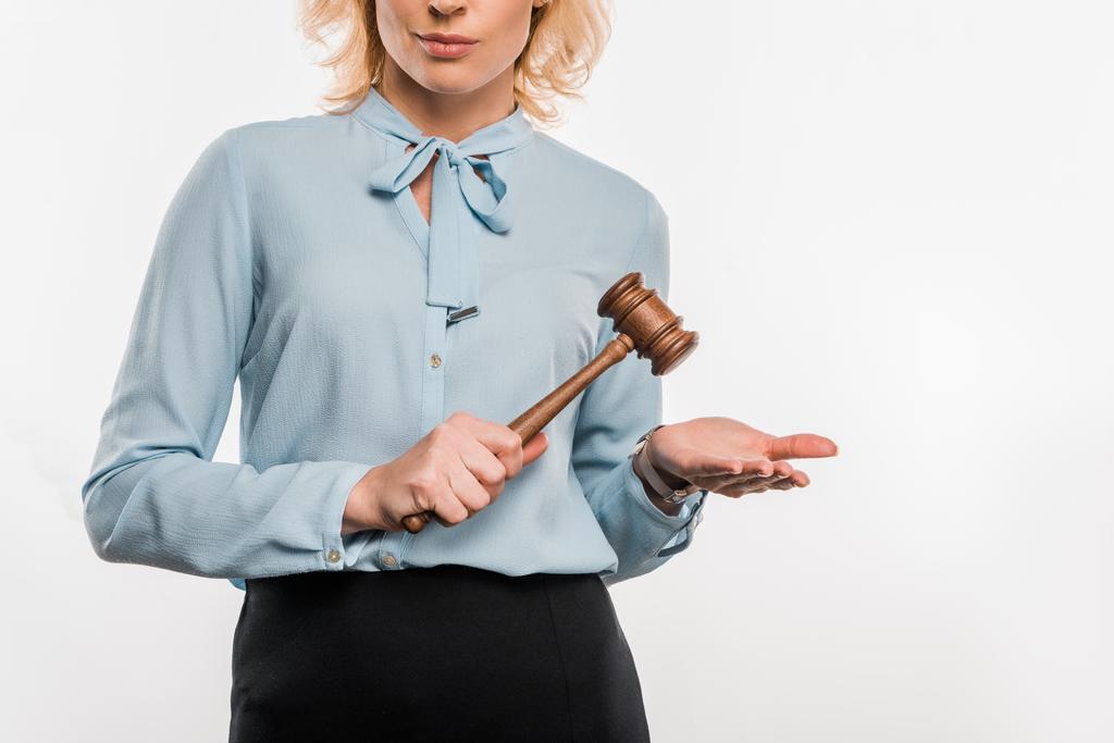 cropped shot of judge holding wooden hammer isolated on white    - Photo, Image